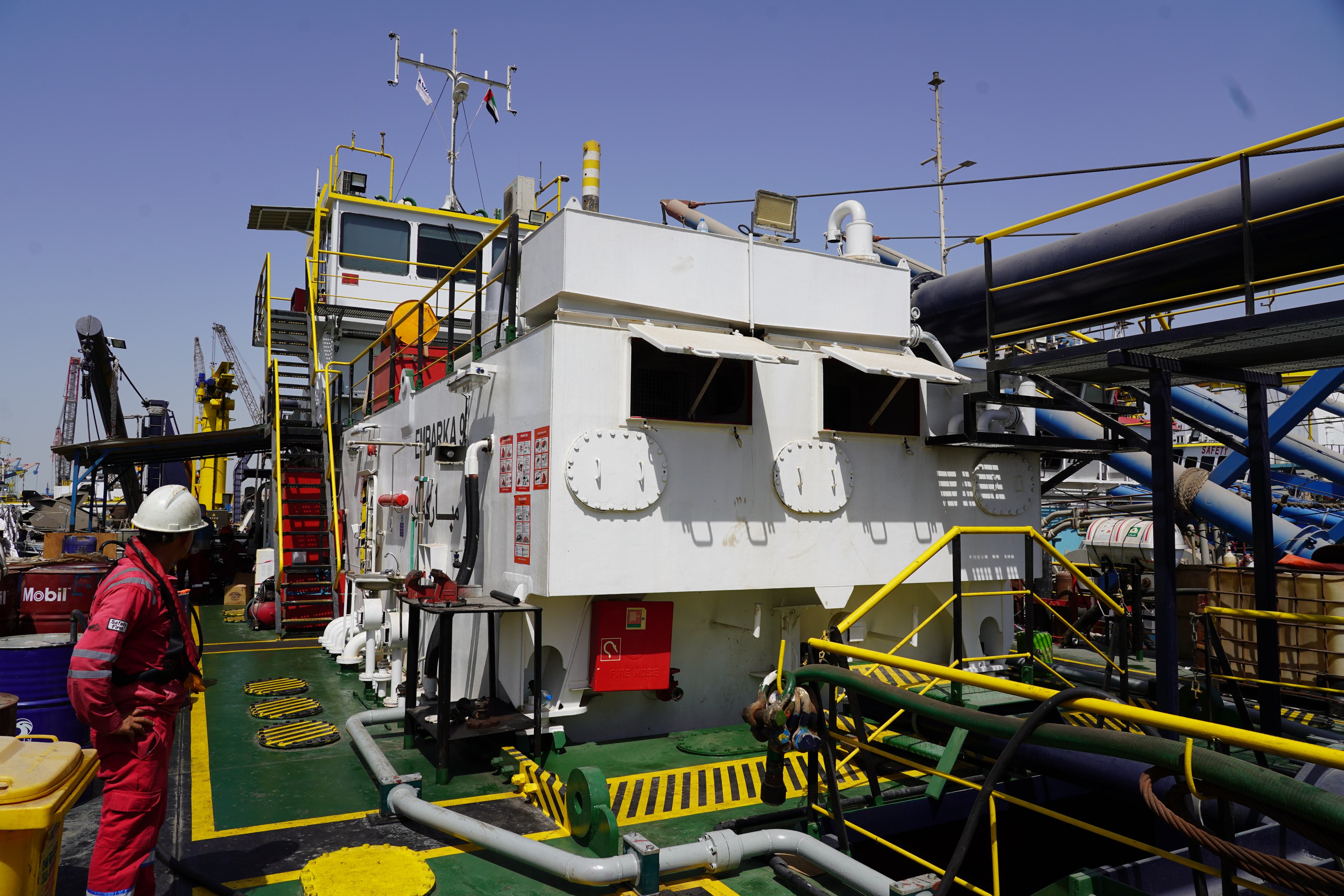 Technical service crew on vessel deck